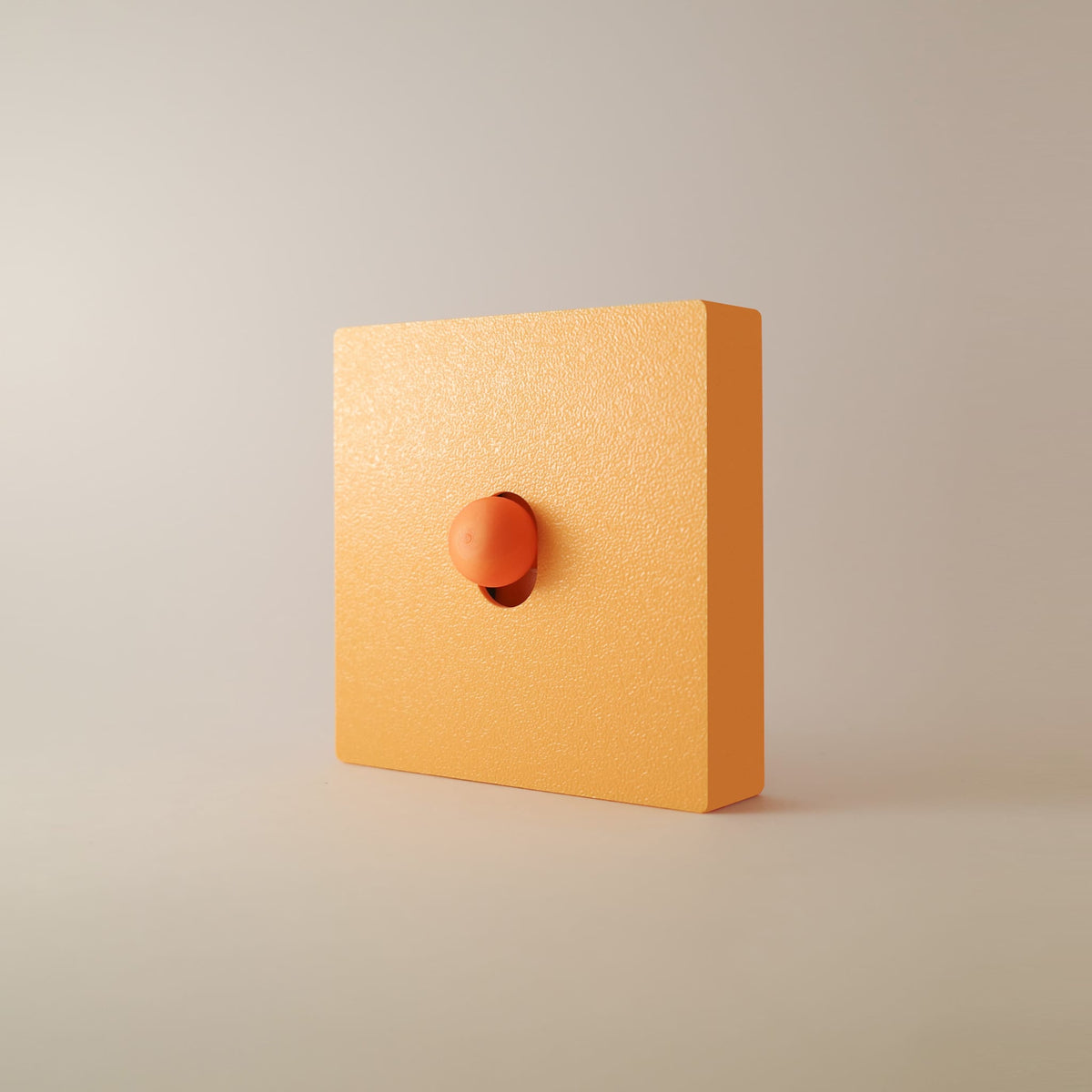 Cache interrupteur Abricot monobloc orange abricot, façade et cadre en une seule pièce, bouton orange vif
